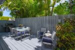 Outdoor dining and deck with grill